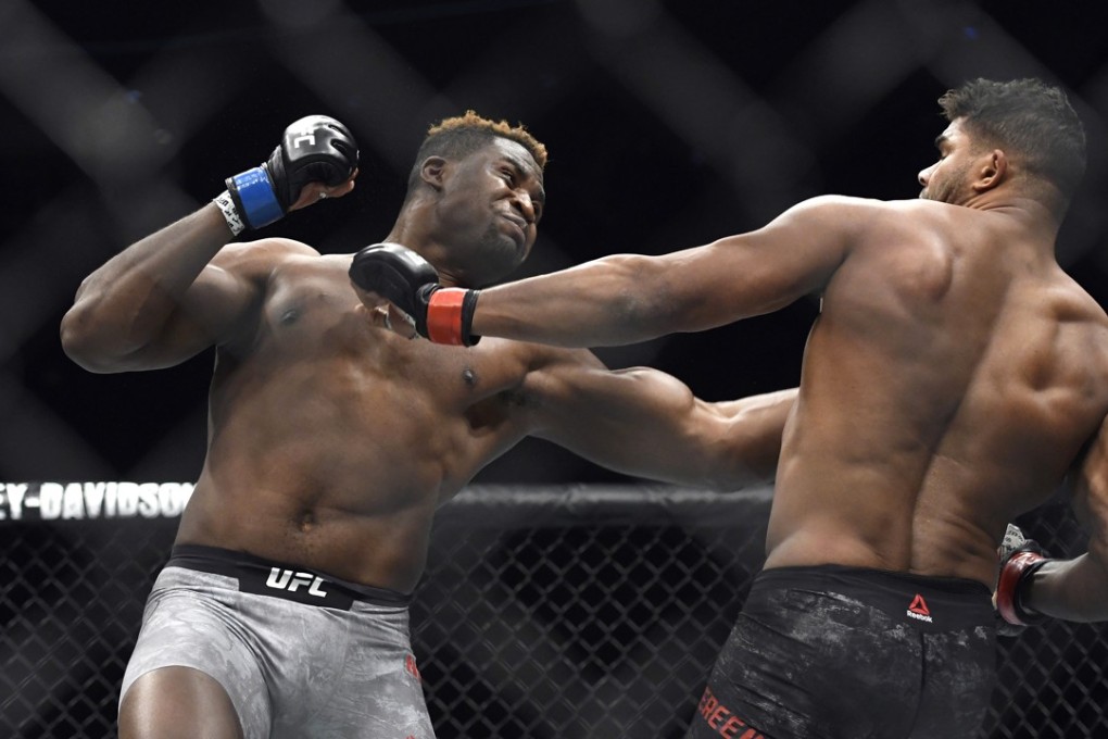 Francis Ngannou (left) knocks out Alistair Overeem with a thunderous punch in the first round at UFC 218. Photo: AP
