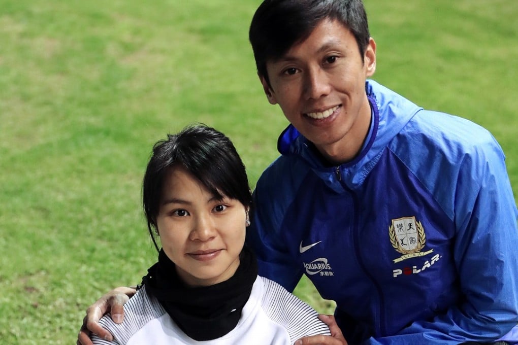 Chan Ka-ho (right) and his wife Christy Yiu Kit-ching pose for a photo during an interview at the Sham Shui Po Sports Ground. Photo: K.Y. Cheng