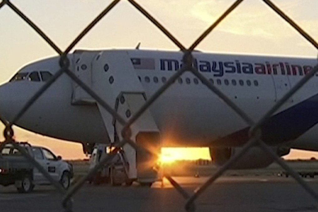 Malaysia Airlines Flight 122 on the tarmac in Alice Springs, Australia. Photo: AP