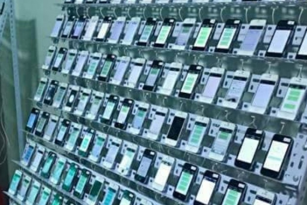 Fake web traffic is generated by click farms that use powerful computers to control thousands of mobile phones programmed to visit websites. Photo: Handout