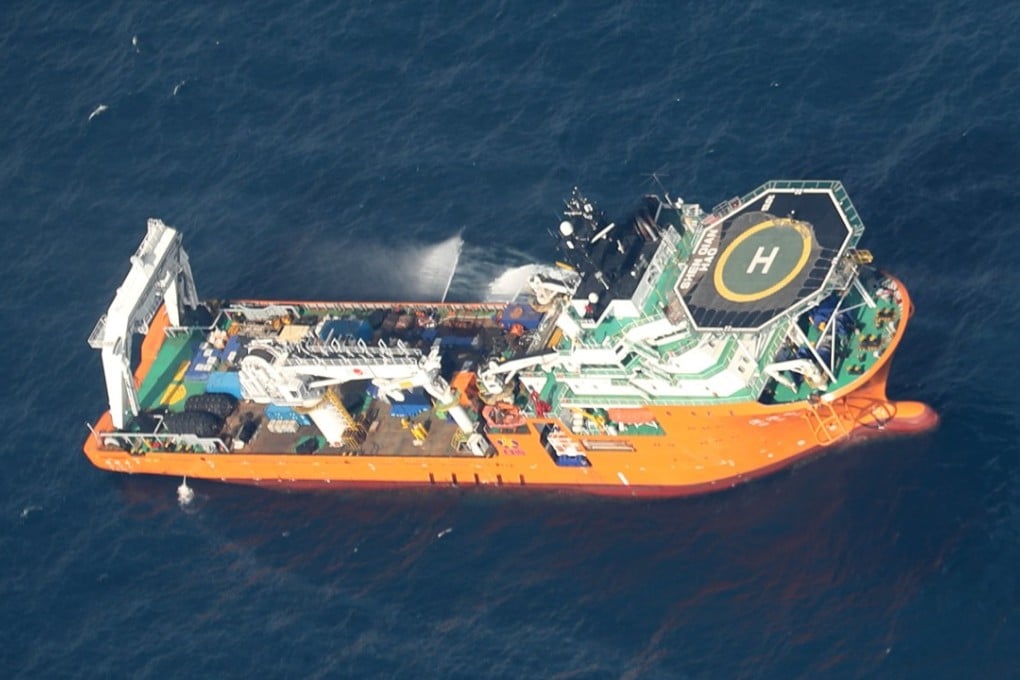A rescue ship cleans an oil slick from the Panama-registered tanker Sanchi, off China’s eastern coast this week. Photo: Handout