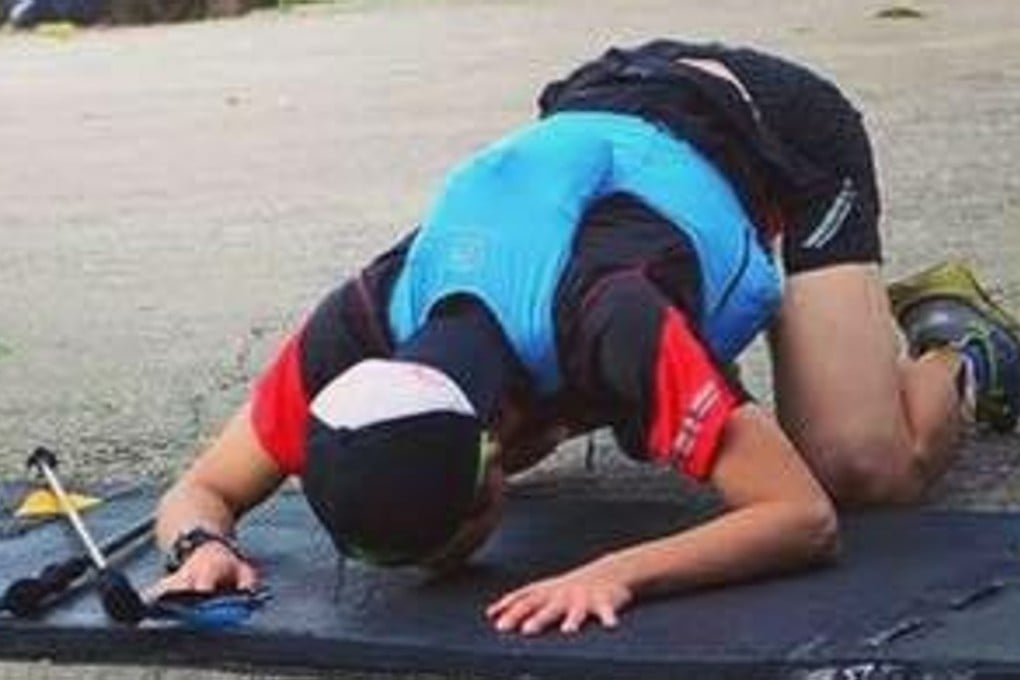 Tony Tong Hei-chun kisses the finish line of a race – he works hard on remembering why he races and avoids concentrating on results. Photos: Jenny Liu