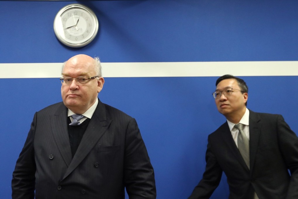 The victor and the vanquished: Bar Association chairman Philip Dykes and outgoing head Paul Lam after the election results were announced early Friday morning in Central. Photo: Sam Tsang