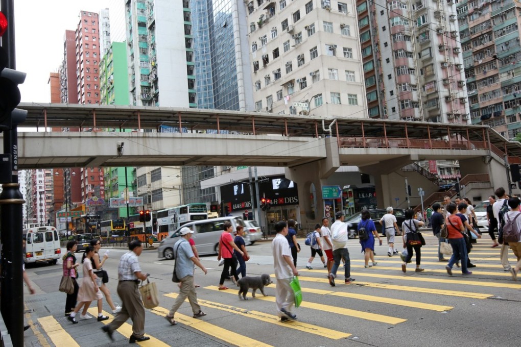The victim was attacked on a busy street in North Point. Photo: Nora Tam