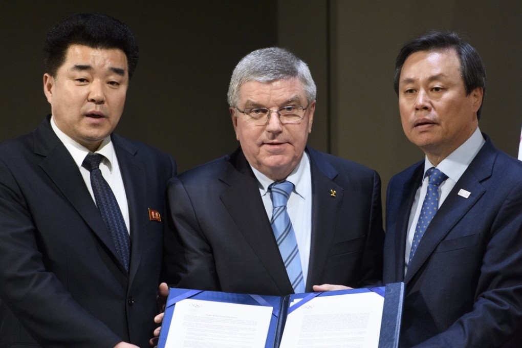 North Korean official Kim Il-guk (left), IOC president Thomas Bach (centre) and South Korea’s Do Jong-hwan. Photo: EPA