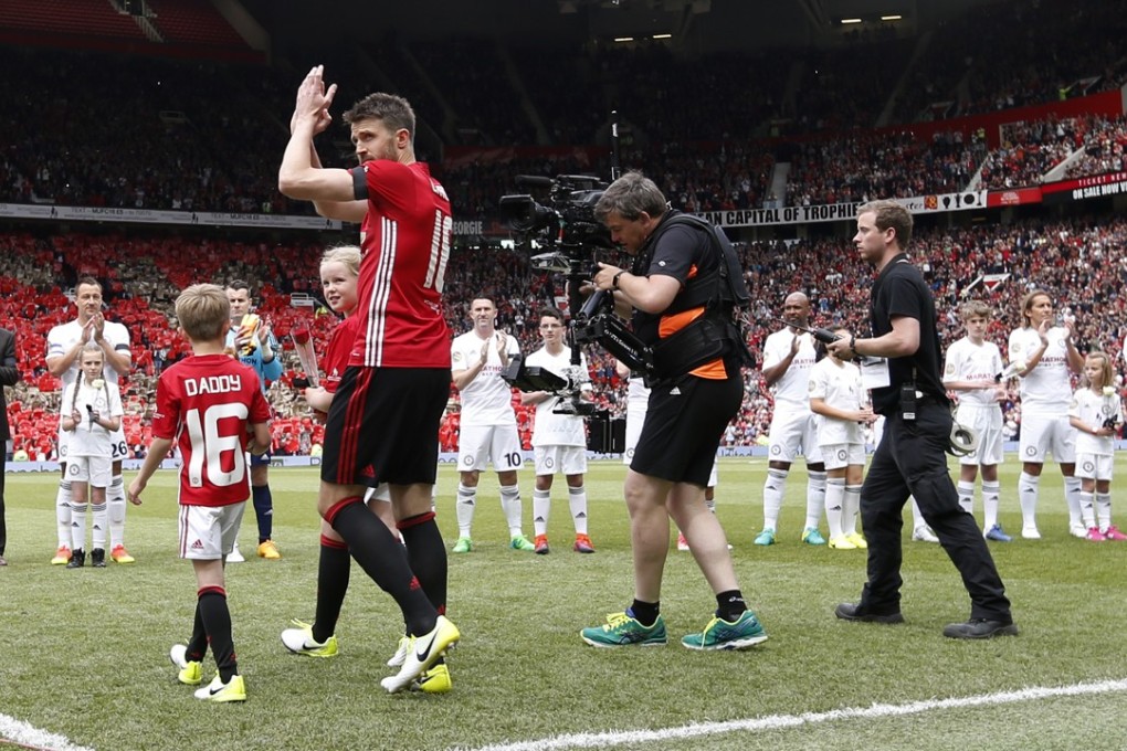 Michael Carrick applauds the fans before his testimonial at Old Trafford. Photo: Reuters