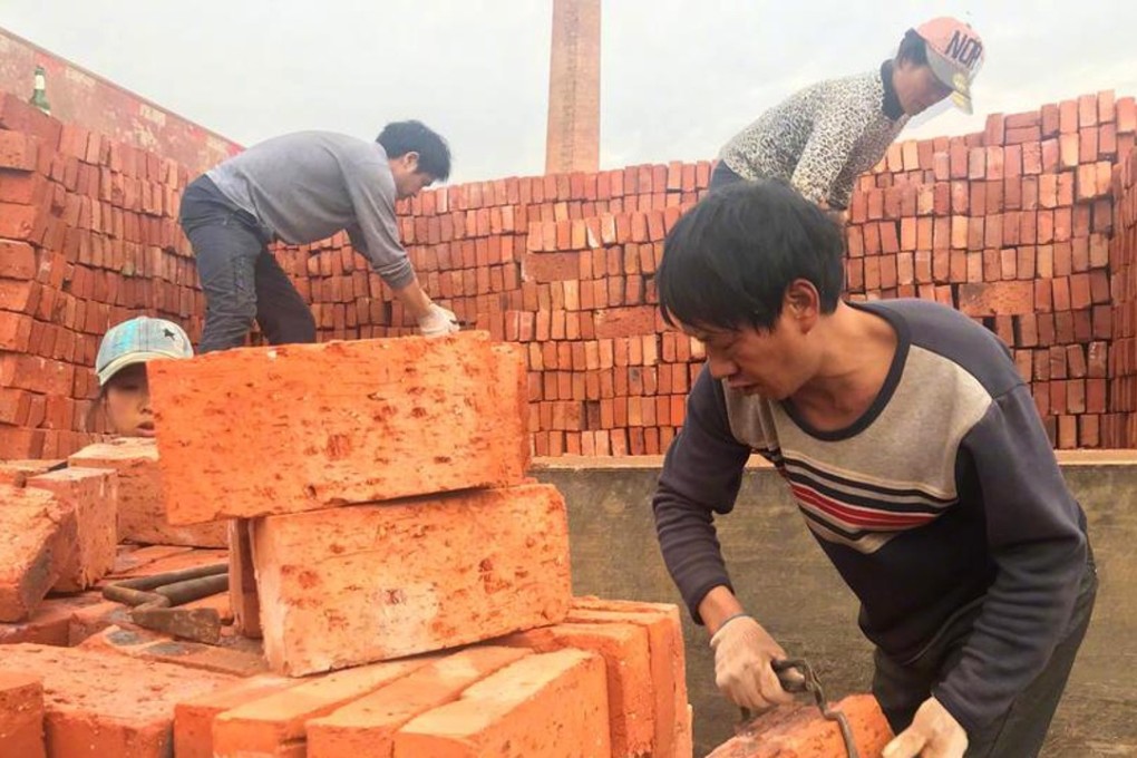 A factory owner in eastern China paid his workers with bricks worth US$12,500. Photo: 163.com