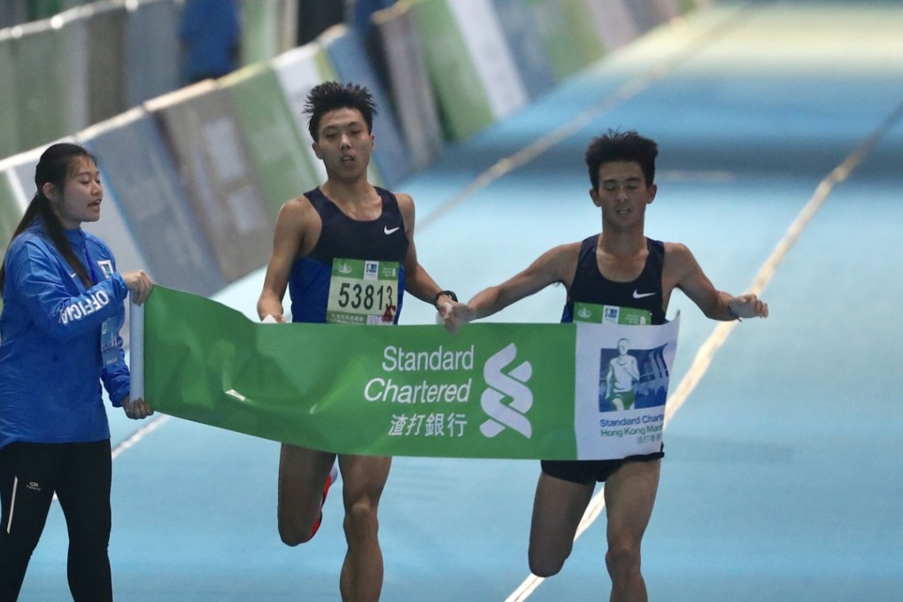 The men's half marathon was a photo finish between Chinese runners Li Chunhui and Liu Hongliang. Photo: Nora Tam