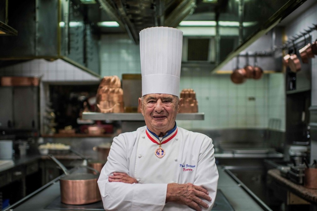 French chef Paul Bocuse posing in his kitchen at L'Auberge de Pont de Collonges. Photo: AFP