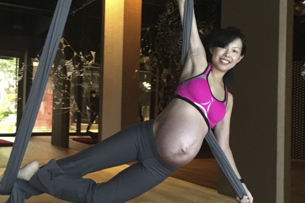 Hongkonger Cindy Cheung practises aerial silk while pregnant, an exercise she continued until the 36th week of her pregnancy.