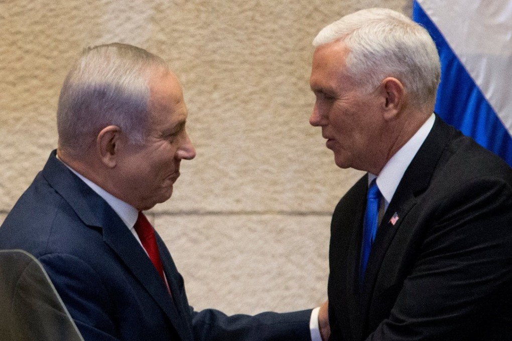 Israel's Prime Minister Benjamin Netanyahu shakes hands with US Vice President Mike Pence in Israel's parliament. Photo: EPA