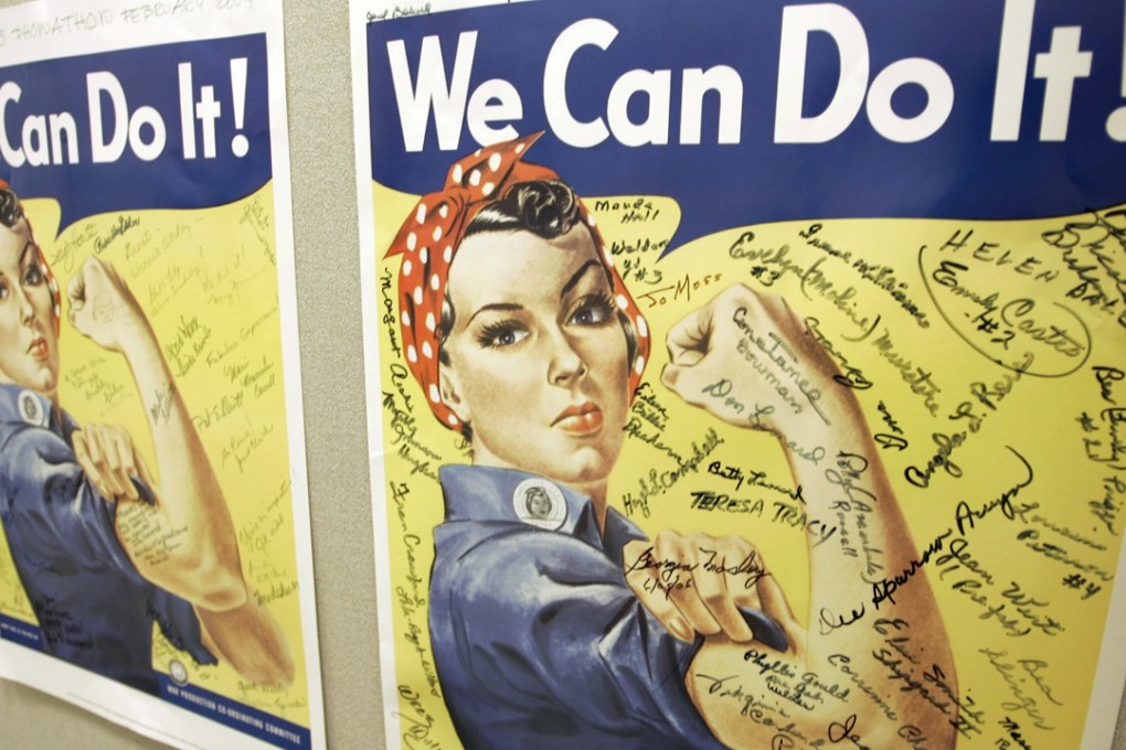 “Rosie the Riveter” posters showing signatures of women wartime factory workers are seen at the offices of the Rosie the Riveter/World War II Home Front National Historic Park in Richmond, California. Photo: AP