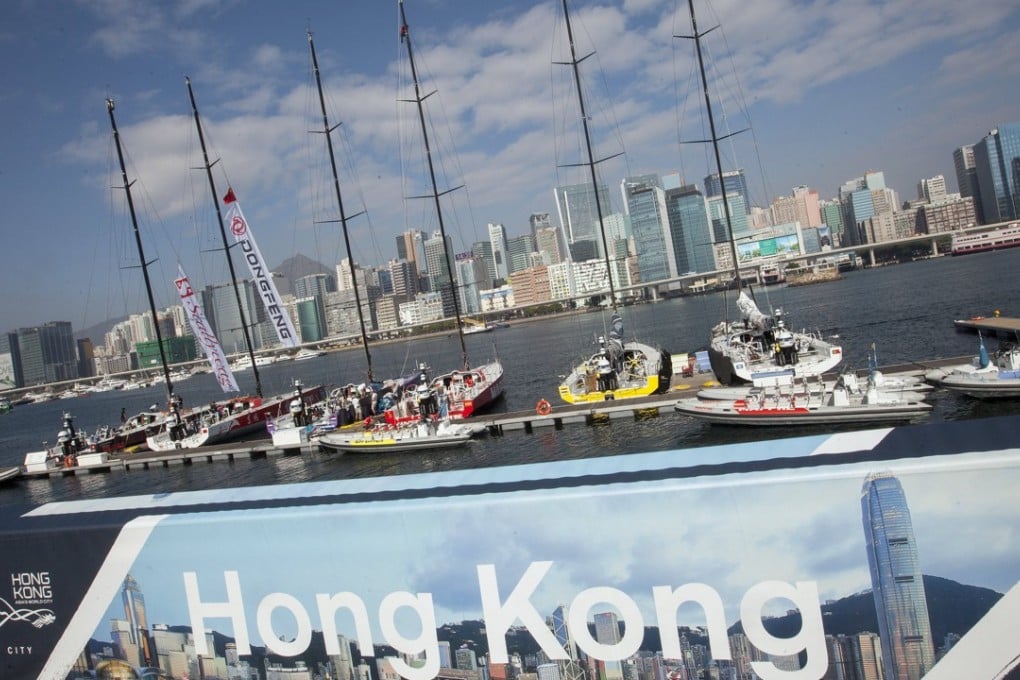 Volvo Ocean Race sailing boats are moored at a jetty in the finish area in Kai Tak. Photo: EPA