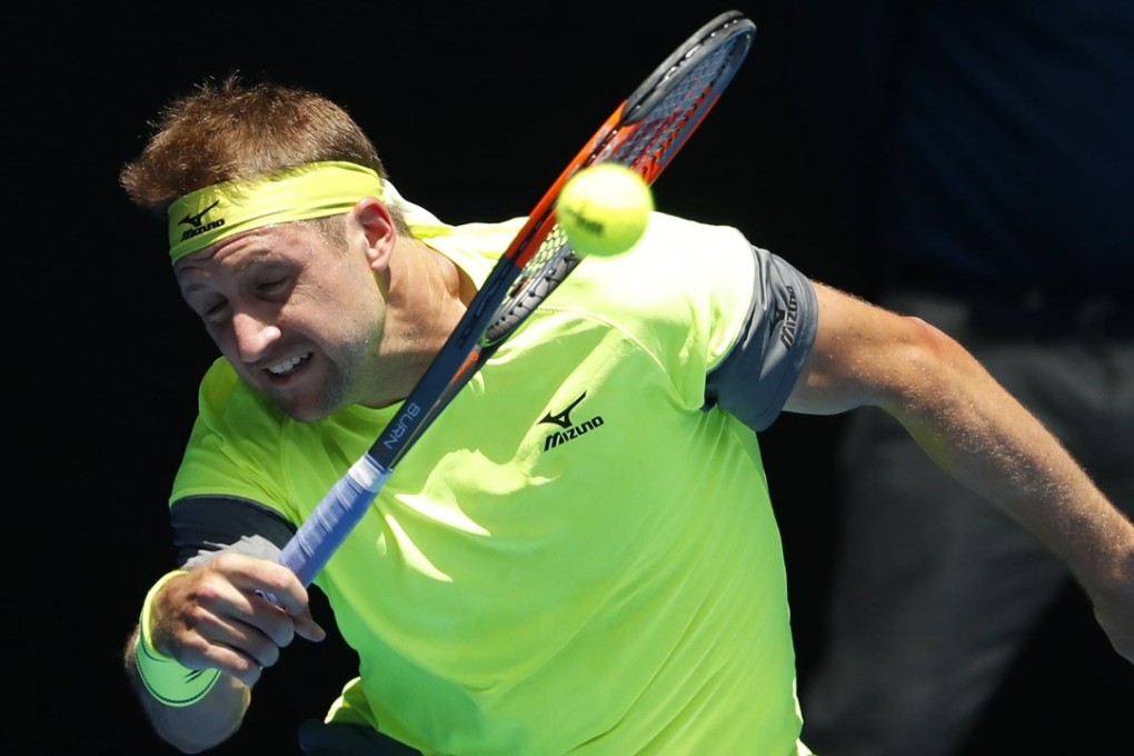 Tennys Sandgren of the US in action against Hyeon Chung of South Korea at the Australian Open. Photo: EPA