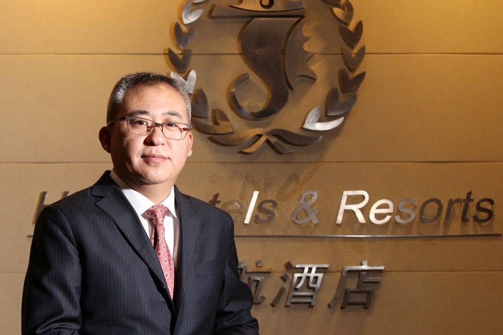 Bai Haibo, HNA Hospitality Group chairman and CEO says the Carlson Rezidor Hotel Group will expand its hotel number by a quarter in the next two years. Photo: Simon Song