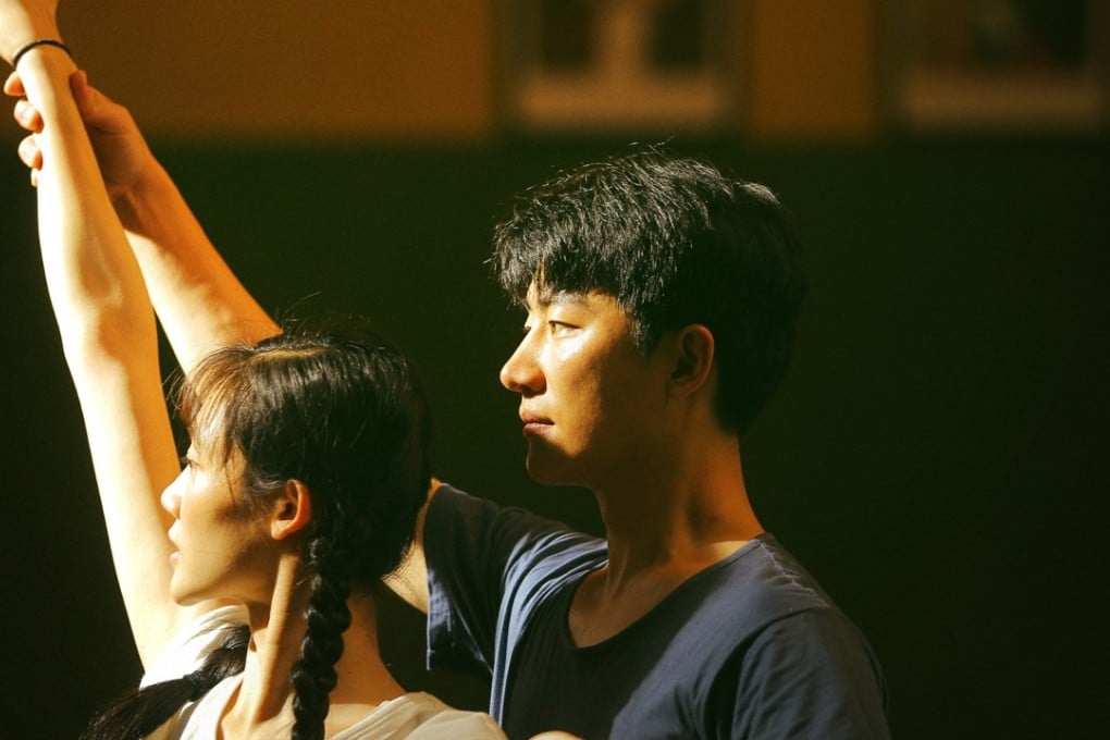 Miao Miao and Huang Xuan in a still from Youth (category IIB: Mandarin), directed by Feng Xiaogang. Elaine Zhong co-stars.