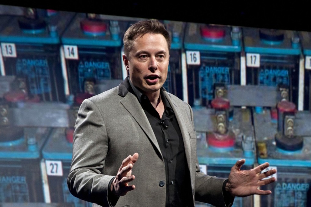 In this April 30, 2015 file photo, Tesla Motors CEO and SpaceX CEO and CTO Elon Musk, introduces a new line of residential and commercial batteries to a crowd of invited guests, media and Tesla fans at their design studio in Hawthorne, California. Musk just got a 10-year deal from the company. Photo: Los Angeles Times/TNS