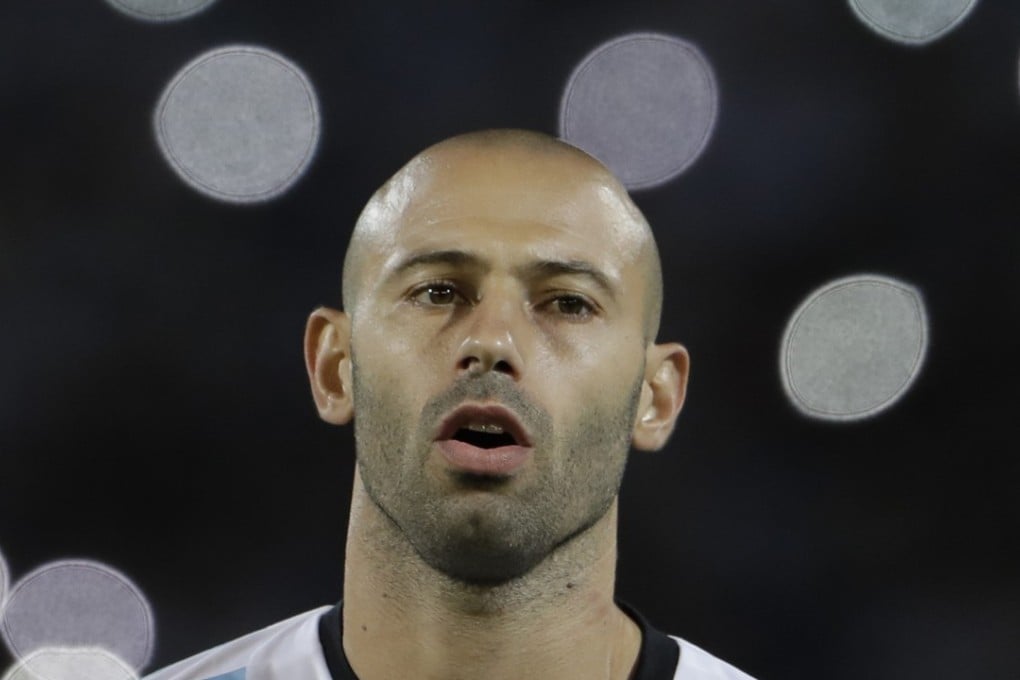 Argentina midfielder Javier Mascherano listens to the national anthem before a 2018 World Cup qualifying soccer match against Paraguay. Photo: AP