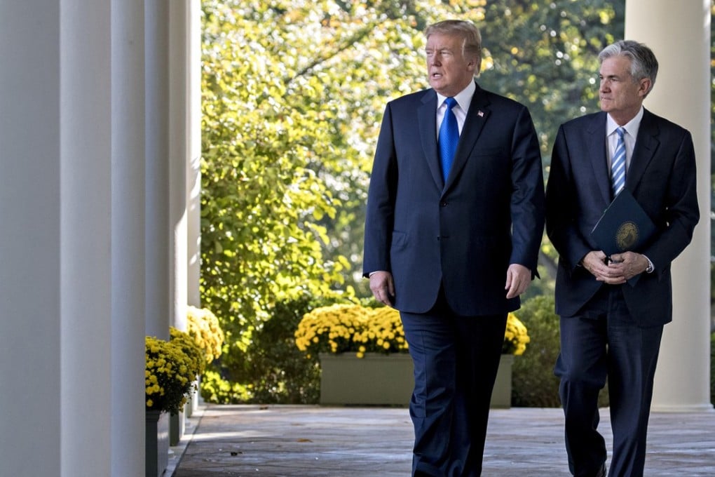 US President Donald Trump, left, and Jerome Powell, Trump's nominee as chairman of the Federal Reserve, walk out to a nomination announcement in the Rose Garden of the White House on November 2, 2017. Photo: Bloomberg