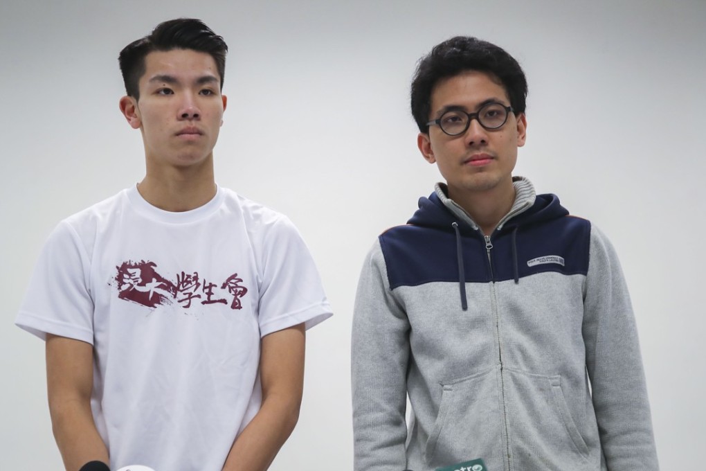 Lau Tsz-kei (left), member of Baptist University Union and another student, Andrew Chan Lok-hang (right), attend a media conference at the Baptist University in Kowloon Tong on Wednesday. Photo: SCMP / Edward Wong