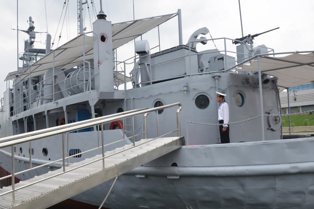 A North Korean seaman aboard the USS Pueblo, a US Navy ship captured by North Korea in 1968 and now moored in Pyongyang and serving as a museum and symbol of North Korean military might. Picture: AFP