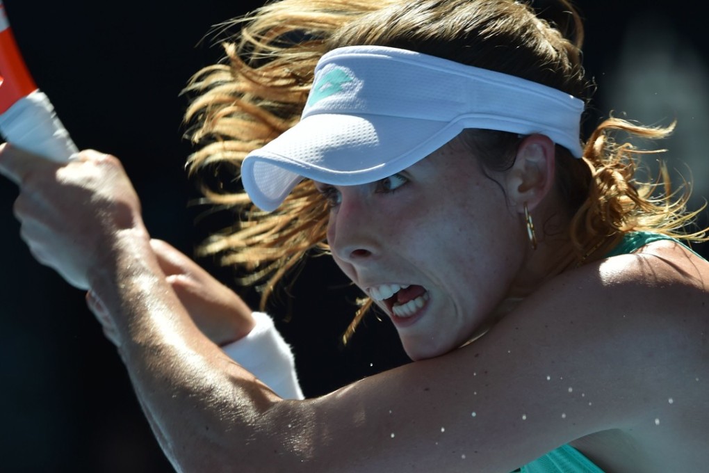 Alize Cornet hits a return against Elise Mertens at the Australian Open. Photo: AFP