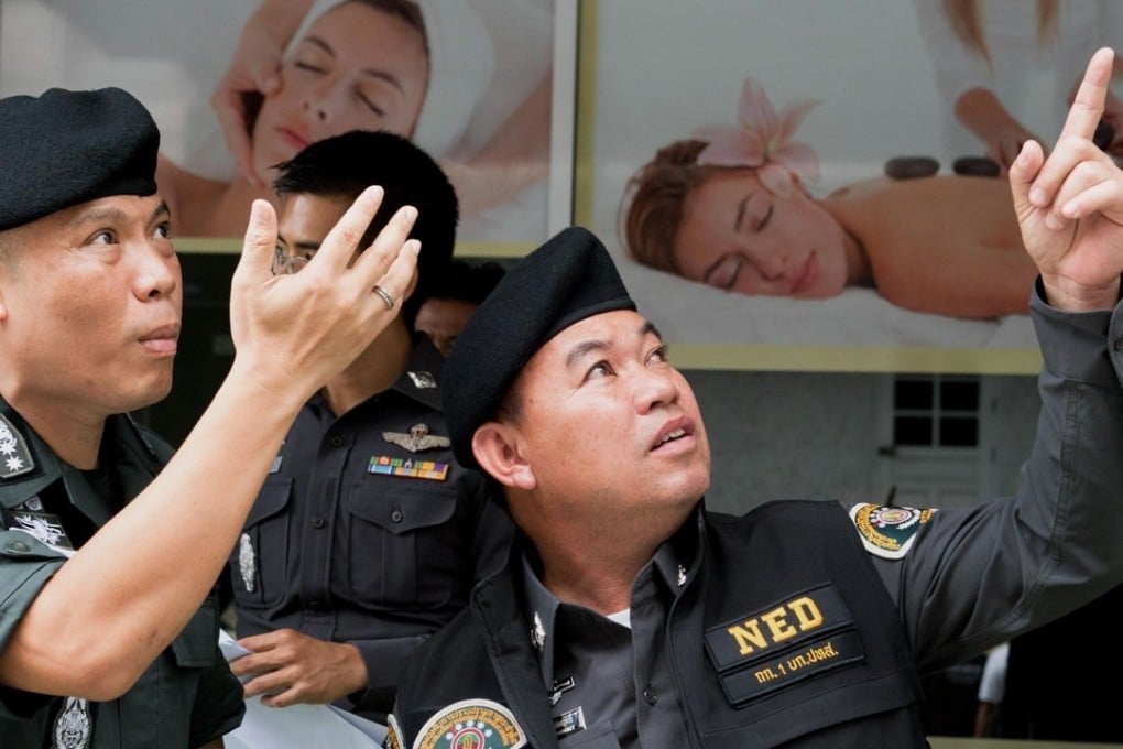 Thai police check if a Bangkok brothel is illegally siphoning off groundwater. Photo: AFP