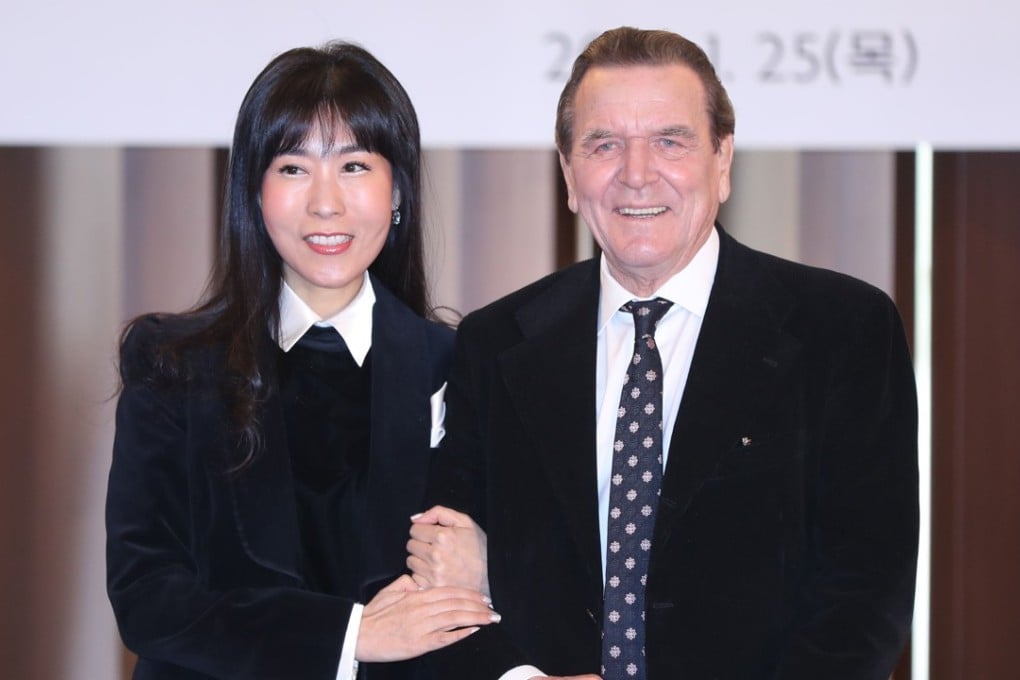 Former chancellor of Germany Gerhard Schroeder with his South Korean partner Kim So-yeon. Photo: AFP