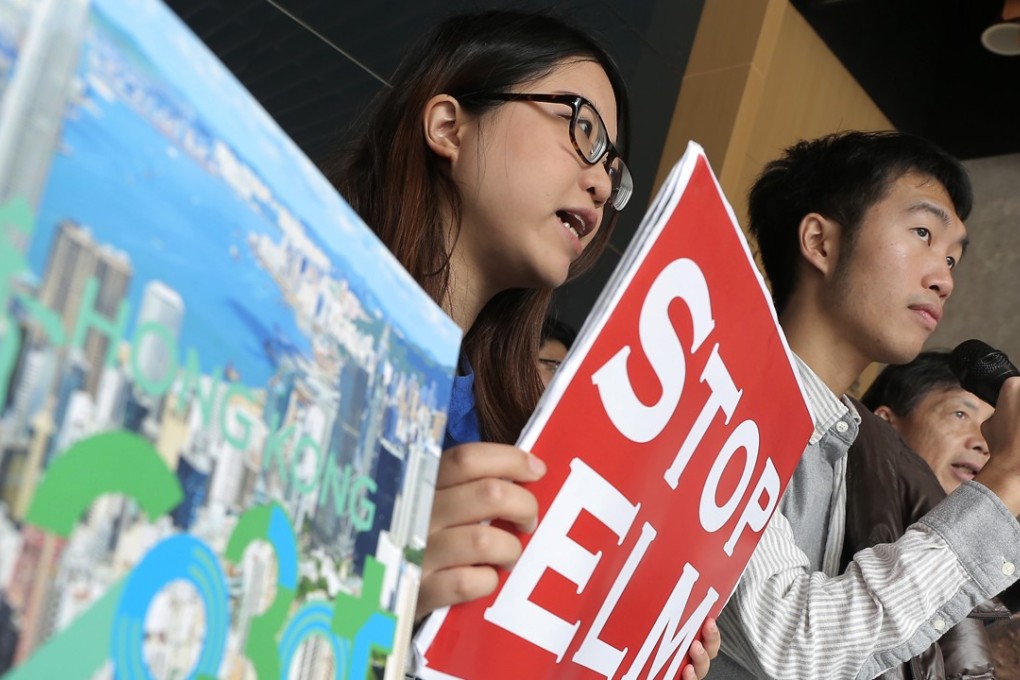 Protesters shout slogans against the planned East Lantau Metropolis (ELM), outside a public forum held by the government on “Hong Kong 2030+: Towards a Planning Vision and Strategy Transcending 2030”, at the Chinese University of Hong Kong in Sha Tin in December 2016. Photo: Paul Yeung