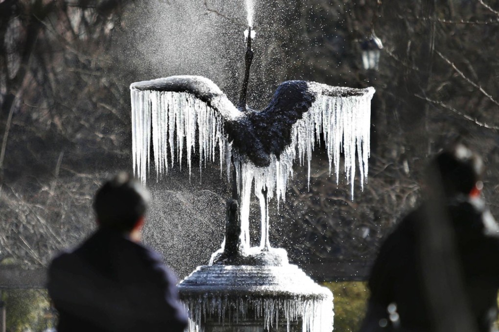 Icicles form on a statue at central Tokyo's Hibiya Park as temperatures fell to the coldest recorded in the Japanese capital in 48 years. Photo: Kyodo