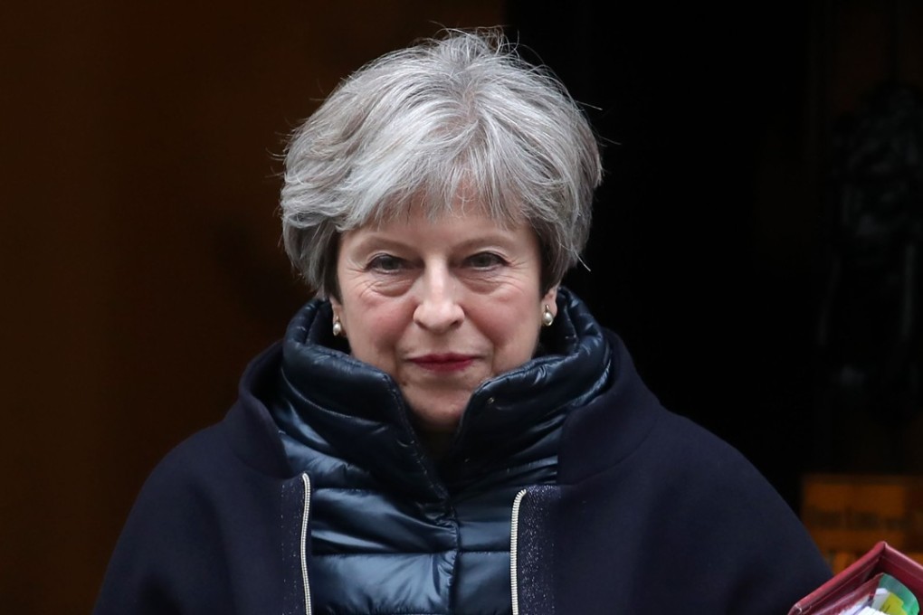 Theresa May will visit Beijing, Shanghai and Hubei in her first visit to China since becoming prime minister in 2016. Photo: AFP