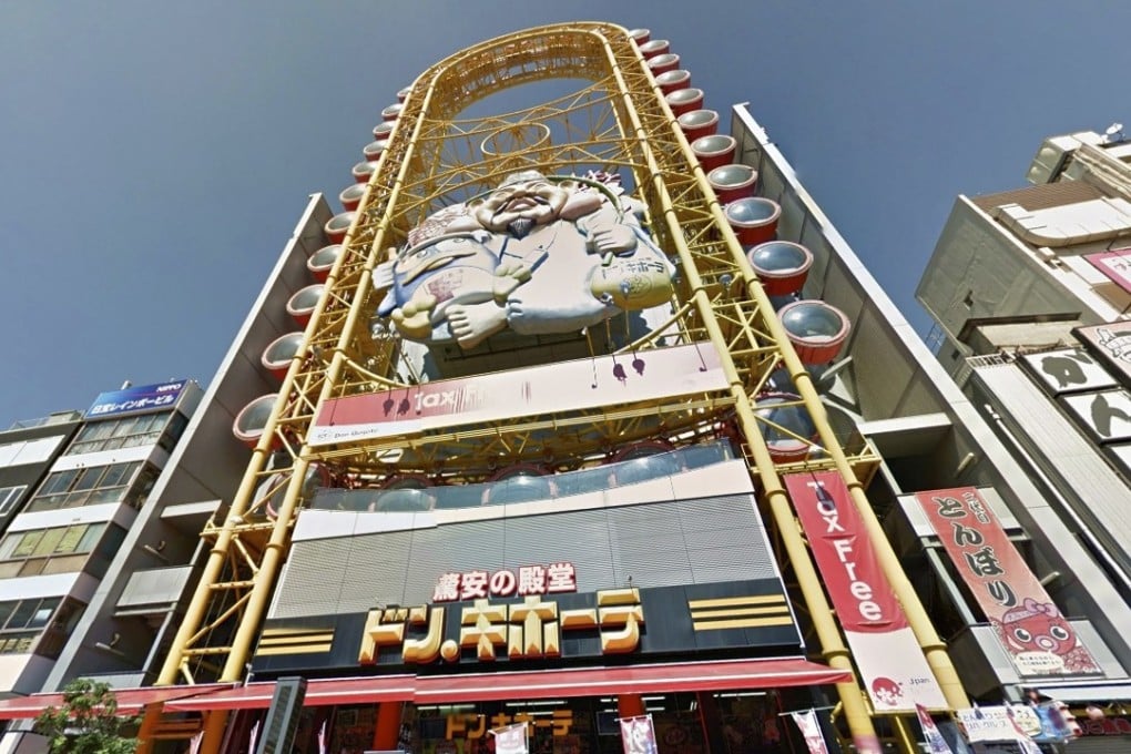 The fairground ride at the Don Quijote discount store, in Dotonbori, Osaka.