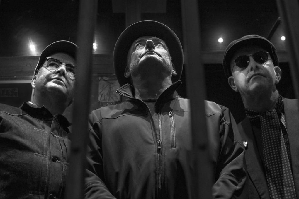 The Ruts DC (from left) Dave Ruffy (drums), Segs and Leigh Heggarty (guitar).