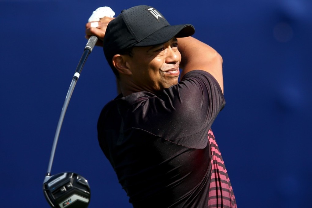 Tiger Woods plays his shot from the seventh tee during the first round of the Farmers Insurance Open at Torrey Pines. Photo: AFP