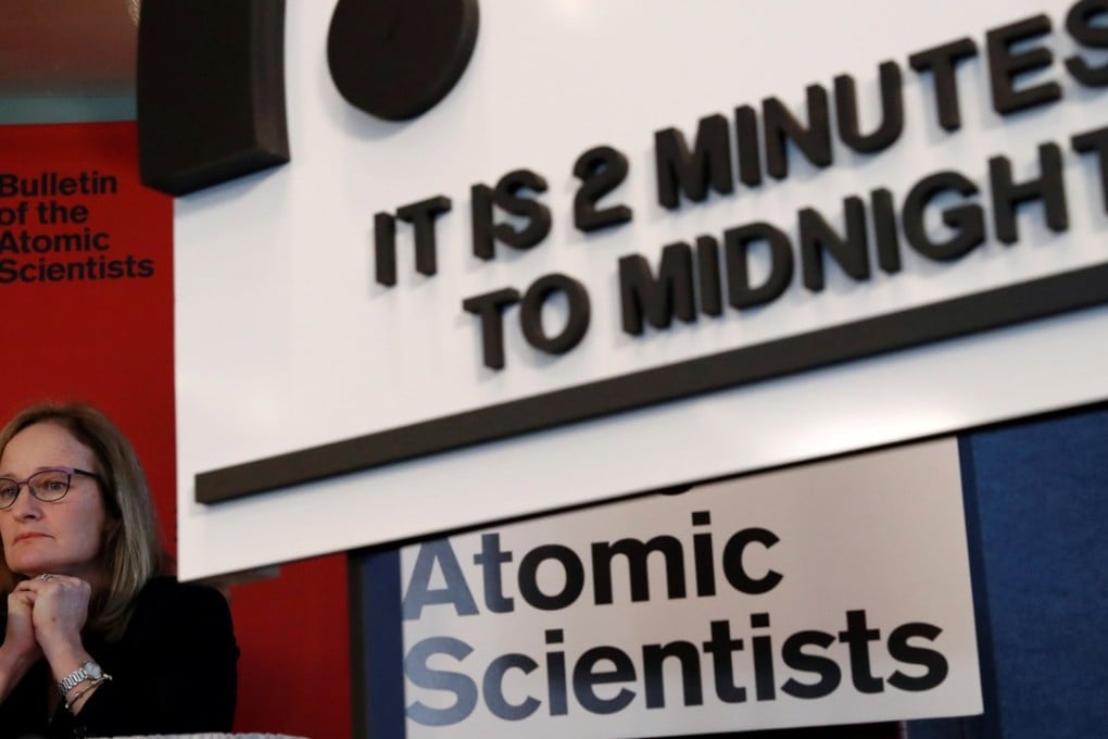 Rachel Bronson, president and CEO of the Bulletin of the Atomic Scientists listens to her fellow members talk about their decision to move the 'Doomsday Clock' hands to two minutes until midnight at a news conference in Washington, on January 25, 2018. The clock is a metaphor for how close humanity is to destroying the planet. Photo: Reuters