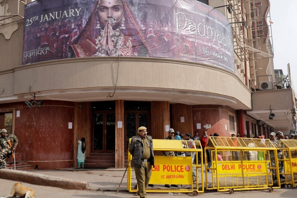 Security personnel stand guard outside a theatre after the release of Bollywood movie ‘Padmaavat’ in New Delhi, India, on January 25, 2018. Photo: Reuters