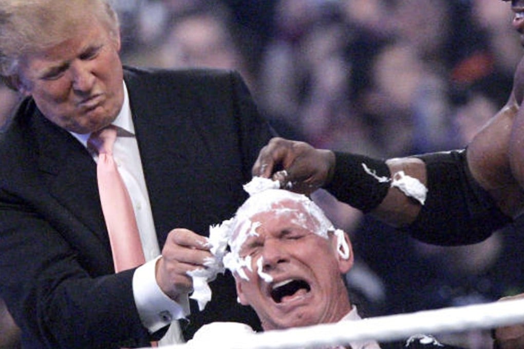 Donald Trump (left) and wrestler Bobby Lashley shave WWE owner Vince McMahon’s head at WrestleMania 23 in 2007. Photo: AP