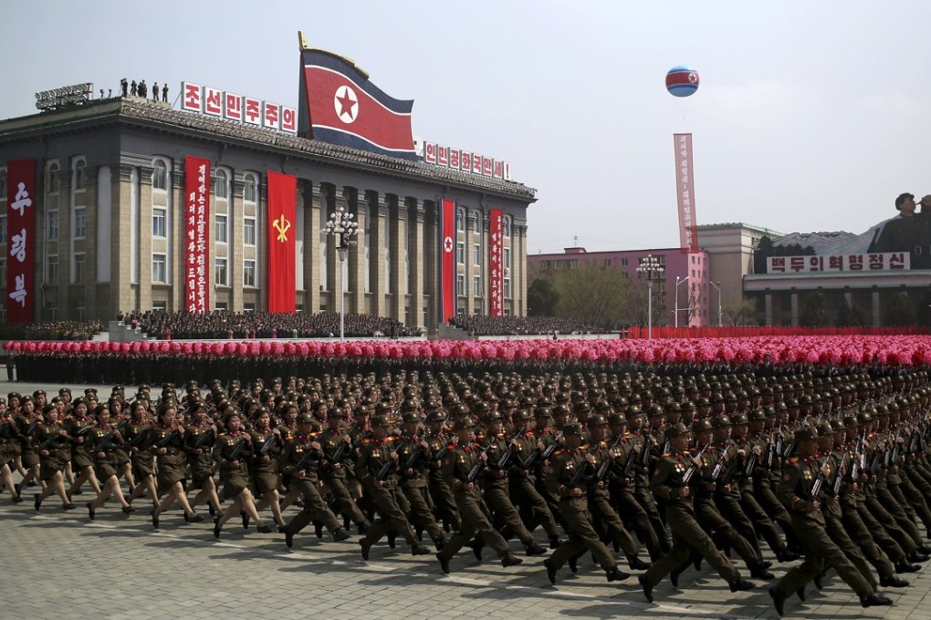 Soldiers march across Kim Il Sung Square during a military parade in Pyongyang, North Korea. Photo: AP