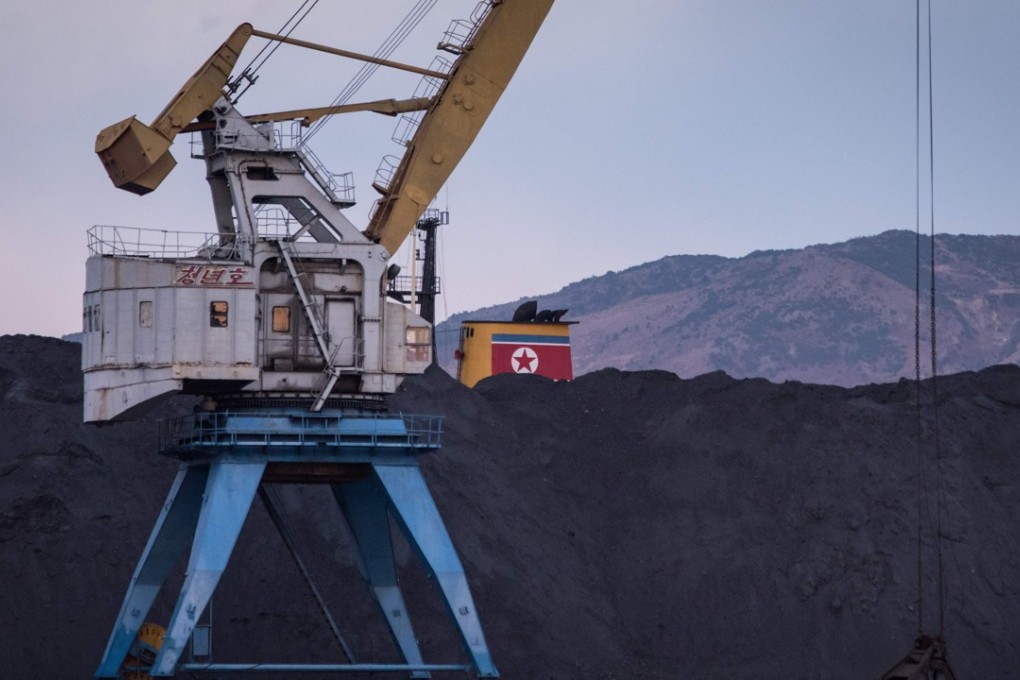 A photo taken on November 21, 2017 shows a mound of North Korean coal at the RasonConTrans coal port at Rajin harbour in the Rason Special Economic Zone. Russia has become a major transshipment point of coal exported by North Korea to evade UN sanctions for its nuclear programm. Photo: AFP