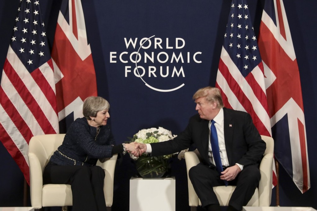 Theresa May and Donald Trump at the World Economic Forum in Davos, Switzerland, on Thursday, January 25, 2018. Photo: Bloomberg