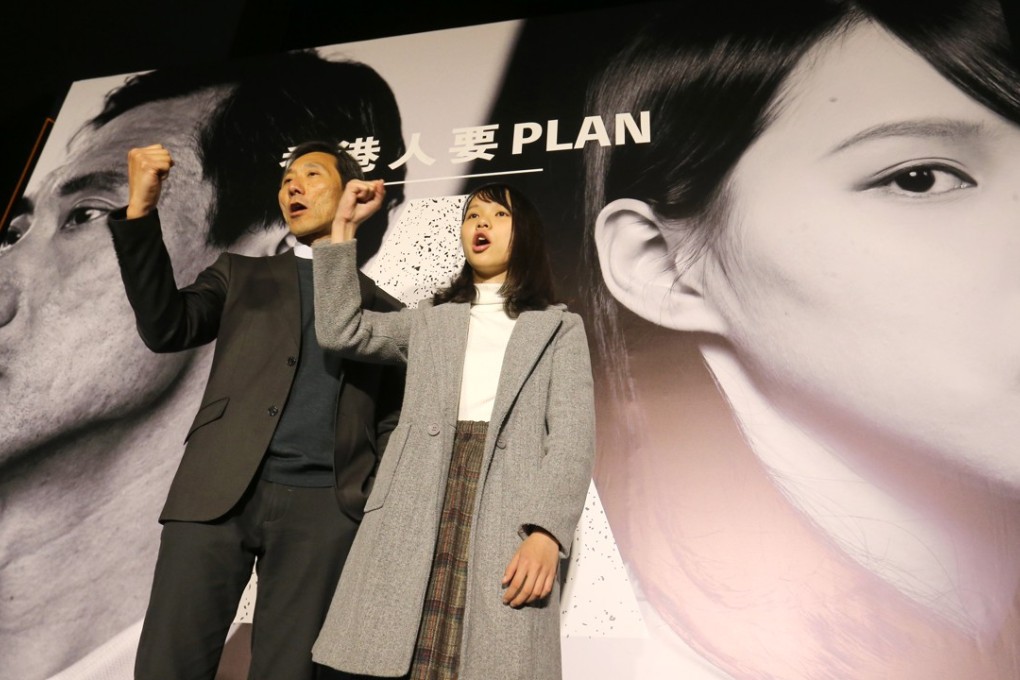 Kowloon West candidate Edward Yiu and disqualified Hong Kong Island candidate Agnes Chow rallying pan-democratic supporters in Tamar on Sunday. Photo: Dickson Lee