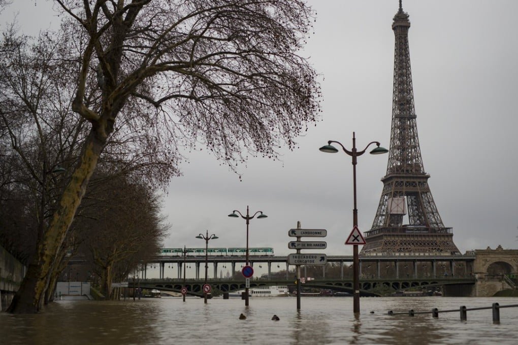 Floodwaters overflow the banks of the Seine river, in Paris. Photo: EPA