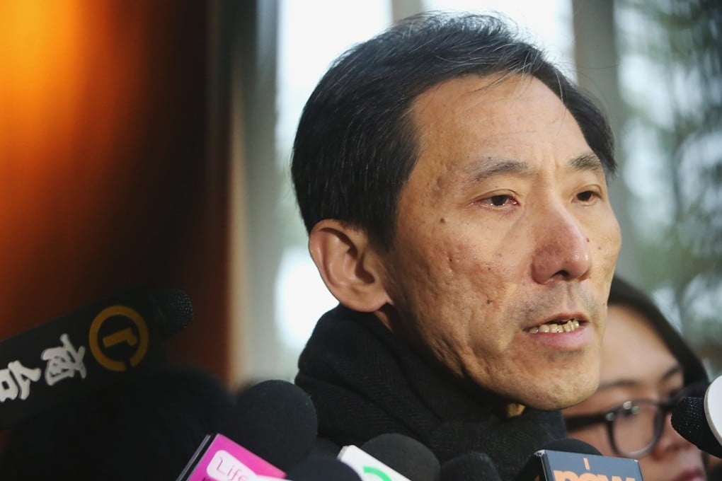 Former and would-be lawmaker Edward Yiu speaking outside government headquarters on Monday. Photo: David Wong