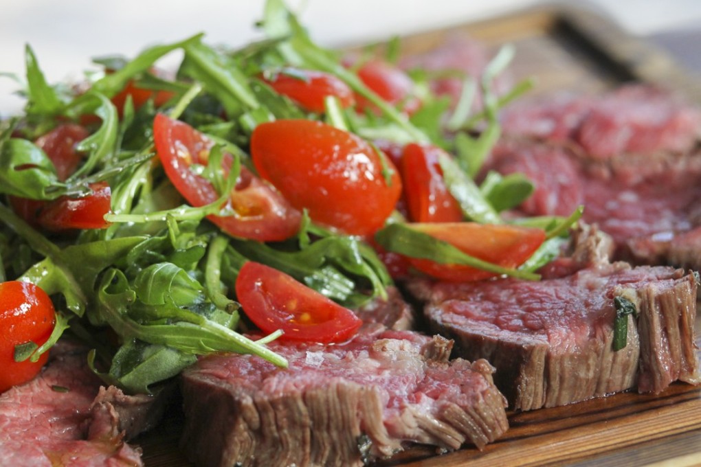 The Butchers' Cut flank steak tagliata with rocket and cherry tomatoes by Pirata, Wan Chai.