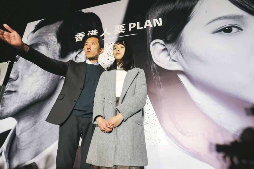 Edward Yiu (left) and disqualified Hong Kong Island candidate Agnes Chow Ting attend a rally outside government headquarters in Tamar on Sunday. Photo: Dickson Lee