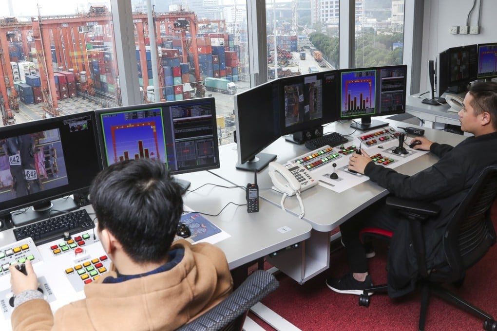 Hongkong International Terminals on Tuesday officially launched its remote-controlled cranes and automated container stacking system at Kwai Tsing Terminal 9. Photo: K Y Cheng