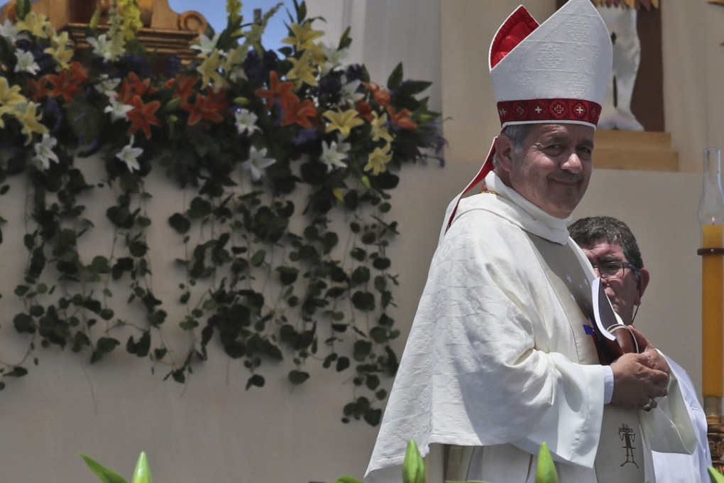 Osornos Bishop Juan Barros attended mass with Pope Francis during his visit to Chile earlier this month. Barros is accused of covering up for the country's most notorious paedophile priest. Photo: AP
