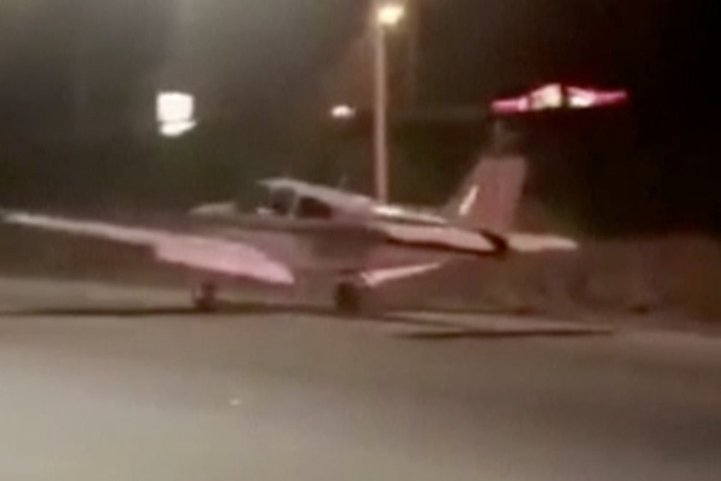 This image made from a video provided by Dora Noriega shows a plane that landed on a motorway south of Los Angeles on Sunday, January 28, 2018. The Costa Mesa Fire Department tweeted Sunday night that the plane landed safely, its occupants got out and that no injuries were reported. Photo: AP