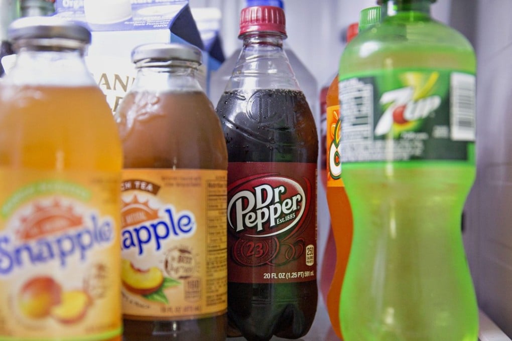 Keurig has snapped up Dr Pepper Snapple Group Inc and its drink brands which include Snapple, Dr Pepper and 7-Up. The deal will pay US$18.7 billion (HK$146.2 billion) in cash to shareholders and assemble a massive beverage distribution network in the US, giving JAB Holding Co businesses even greater control over how Americans eat and drink. File photo: Bloomberg