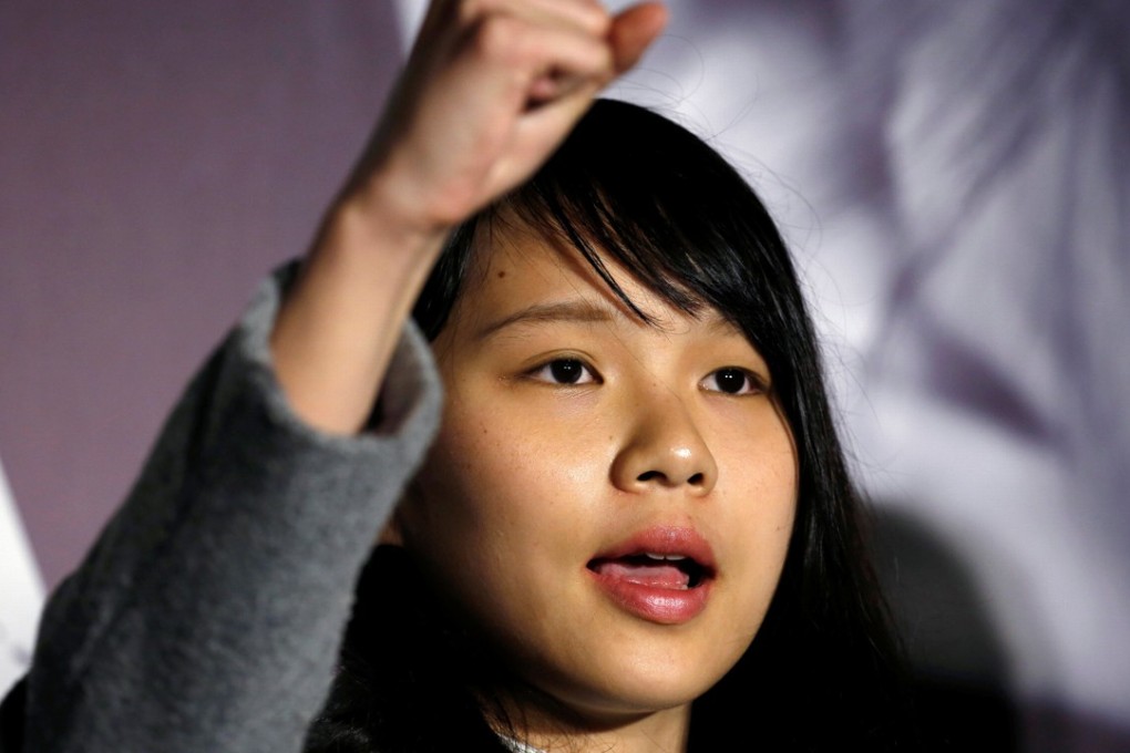 Agnes Chow chants slogans at a rally after she was banned from running in the March by-election to the Legislative Council, in Admiralty on January 28. Photo: Reuters